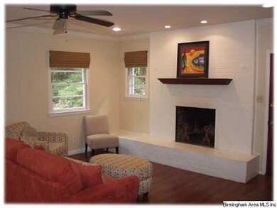 Great wood-burning fireplace in the den
