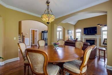 The formal dining room 13x12 offers a wonderful space to enjoy and is open to the den area.