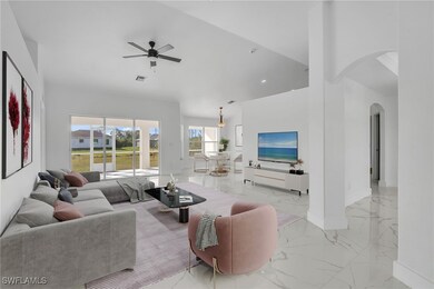 Living area featuring arched walkways, light marbl