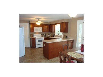 Kitchen with access to laundry room off kitchen an