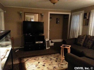 Living Room. The warm. cozy living room features n