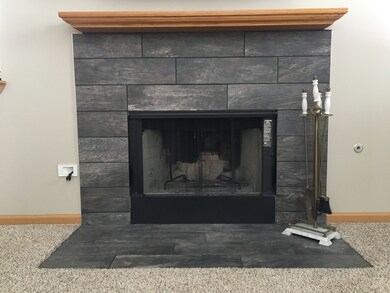 Gas start, wood burning fireplace