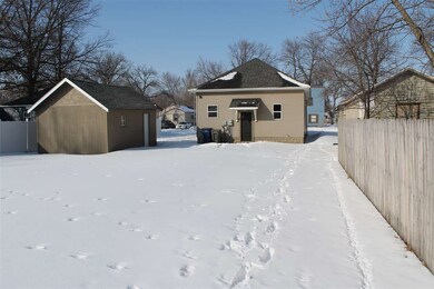 A large backyard with alley access creates all kin