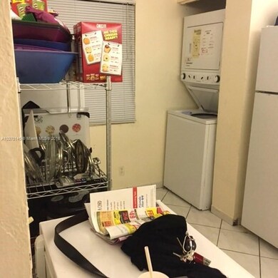 Washer/dryer in kitchen.