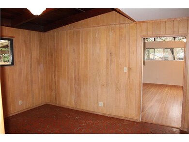 Cozy Den with tile floors and storage space!