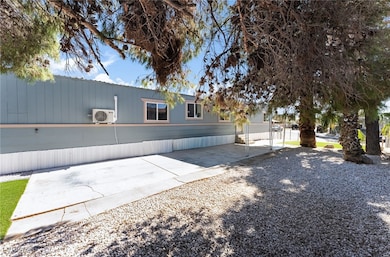 Back of property featuring a patio area