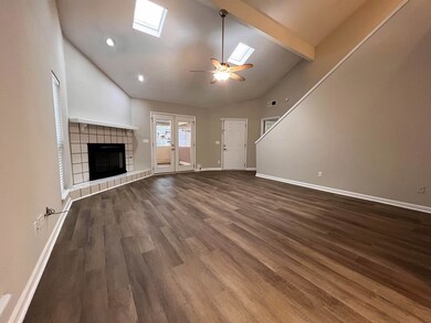 Living room w/ skylights and new LVP flooring