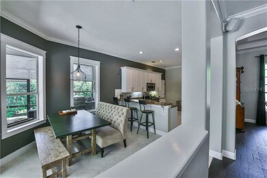 Large breakfast nook with beautiful window trim ou