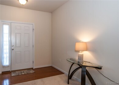 Foyer with hardwoods