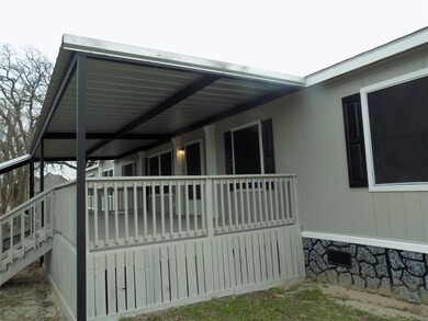 Fenced and covered front porch