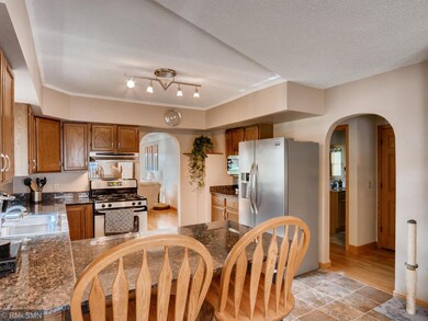 Updated kitchen with eat at bar and open to dining