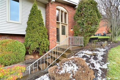 Beautifully manicured front entry!