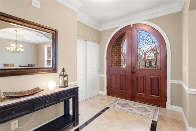 Solid wood, double front door.