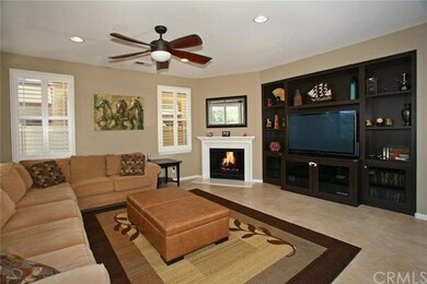 Another view of family room with fireplace and bui