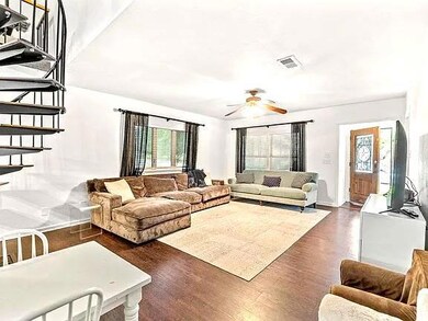 Living room featuring plenty of natural light, st