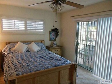 Master bedroom with access to backyard