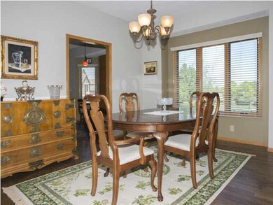 Dining Area with Hardwood Flooring