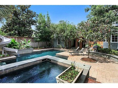 Backyard. The pool area includes a spa and the who