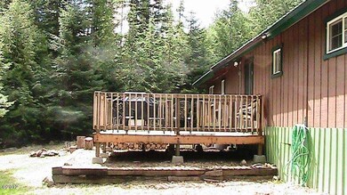 New deck to relax & listen to river
