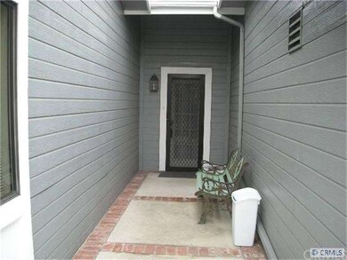 PORCH LEADING TO THE FRONT DOOR