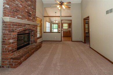 Enjoy the homey and comfy living area by the firep