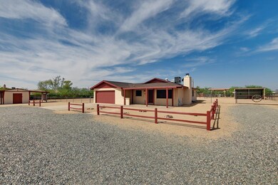 front of home and storage shed