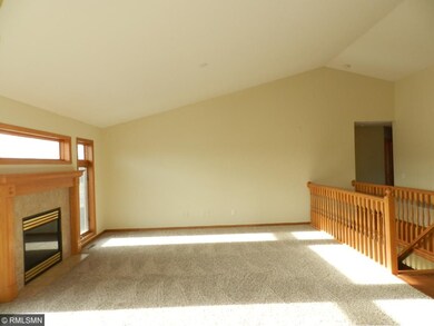 Main level living room features gas fireplace & la