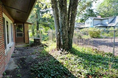 Outside the Sun Room/Office Area is a 16' x 60' Fe