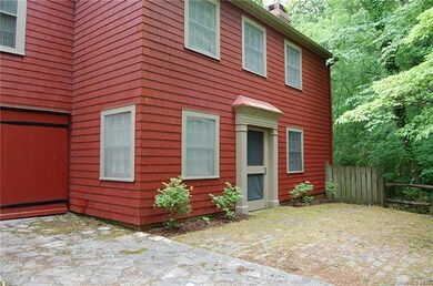 SIDE BASEMENT AND GARAGE ENTRANCE. BASEMENT ALSO H
