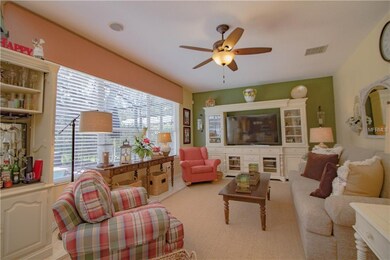 Family room with great view of pool and backyard