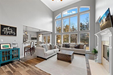Soaring 18' ceiling in the great room with a wall 