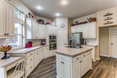 Kitchen has built in desk