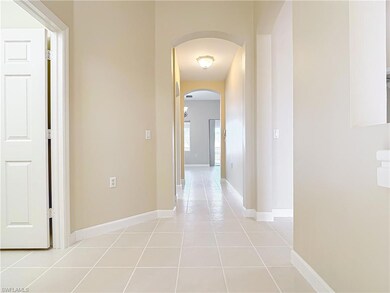 Hall with light ceramic tile