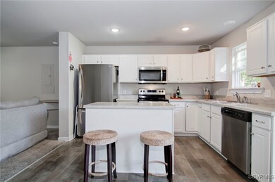 Kitchen with appliances with stainless steel finis