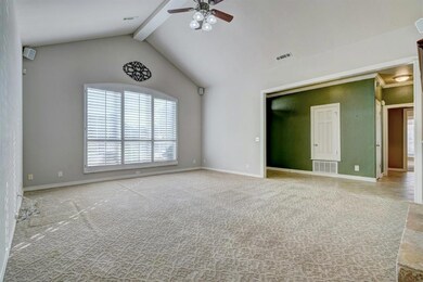 Living area and foyer.