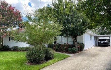 Carport with long driveway