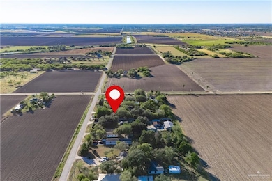 View of property location with large plots for crops and rural landscape