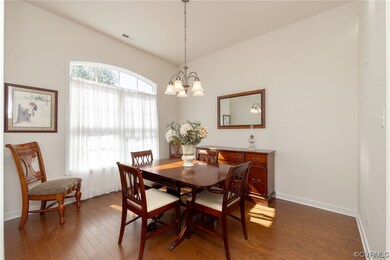 Dining room featuring dark hardwood / wood-style f