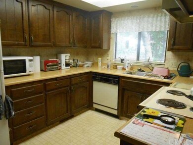 Lots of cupboards in kitchen plus breakfast bar. 