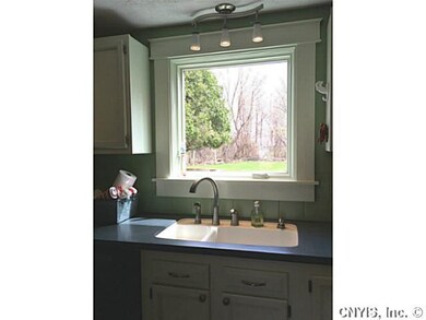 Kitchen. Solid surface counter and sink, with new 