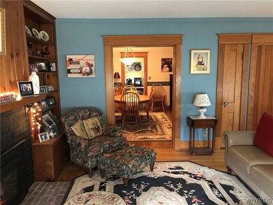 Living Room with FPLC, HDWD floors and natural woo