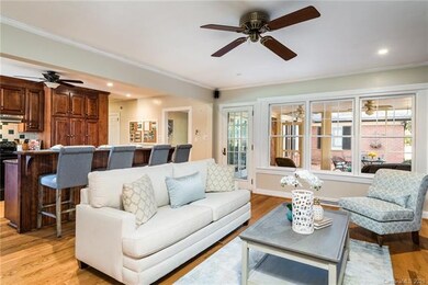 Big family room overlooking screened porch and bri