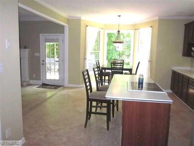Kitchen. view of kitchen breakfast area from garage entry