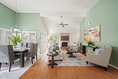 The open floor plan is both inviting and cozy. Wit