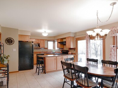 Eat-in kitchen with sliding glass door that opens 