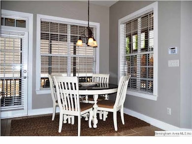 informal dining area : surrounded by a wall of win