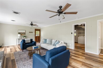 Lower level family room with access to driveway, l