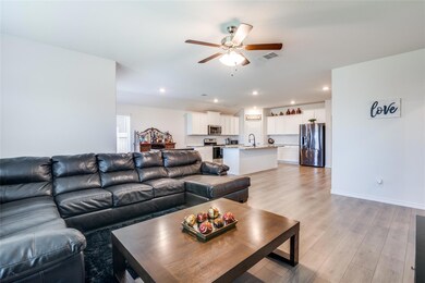 Family room opens into kitchen