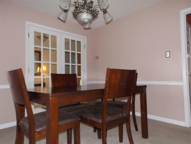 ANOTHER VIEW OF THE BEAUTIFUL FORMAL DINNING ROOM