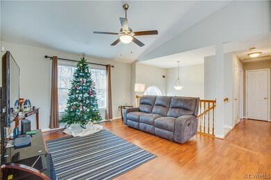 Living room and hallway have hardwoods floors.
